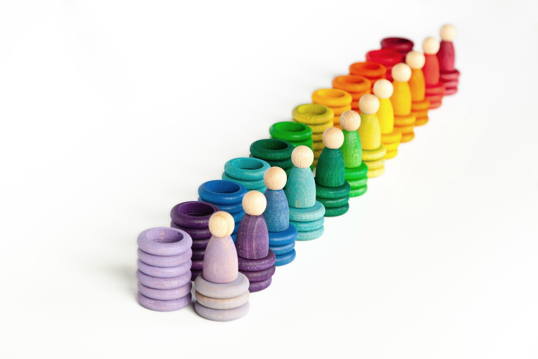 Grapat set of wooden toys in rainbow order