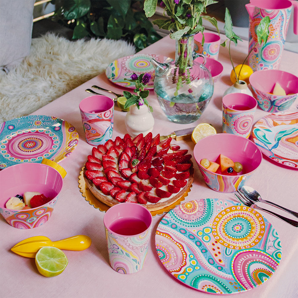 Table setting featuring melamine cup, plate and bowl set by La La Land