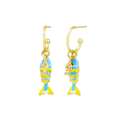 Gold and blue fish-shaped earrings on a white background by Tiger Tree