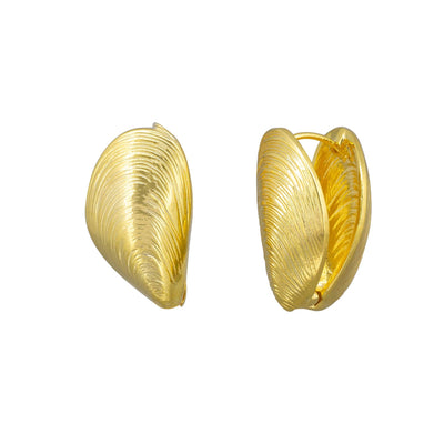Pair of gold hoop earrings on a white background by Tiger Tree