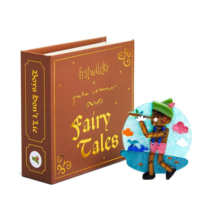 Erstwilder x Pete Cromer Fairytale brooch collection - Boys Don't Lie Brooch next to box