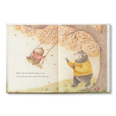 Illustrated book open to two pages with bear characters in an autumn setting.