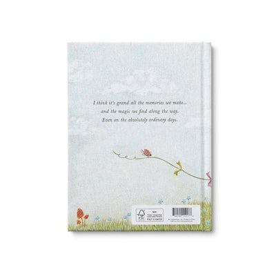 Book with floral design and text on a white background