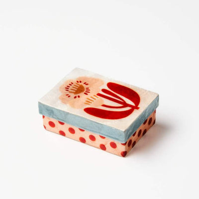 box with floral design on a white background