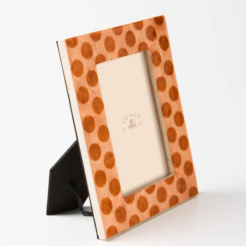 Polka dot photo frame on a white background