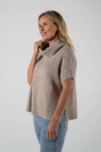 Oatmeal coloured roll neck vest made from recycled polyester from Australian fashion label, See Saw