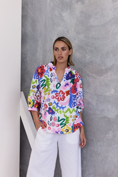 A half sleeve 100% linen top with a bright floral design by Wear Colour (sister brand to See Saw), designed in Australia