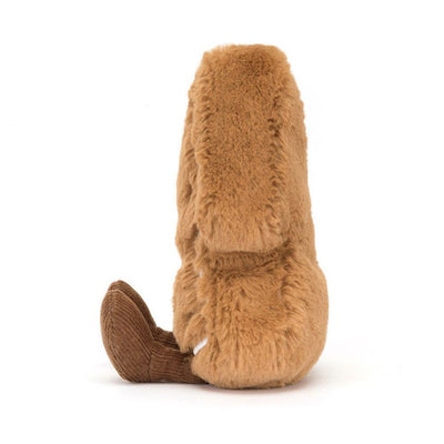 Plush gingerbread cookie toy with a smiley face on a white background by Jellycat | Jellycat Stockist at Zebra Finch in Newcastle, NSW