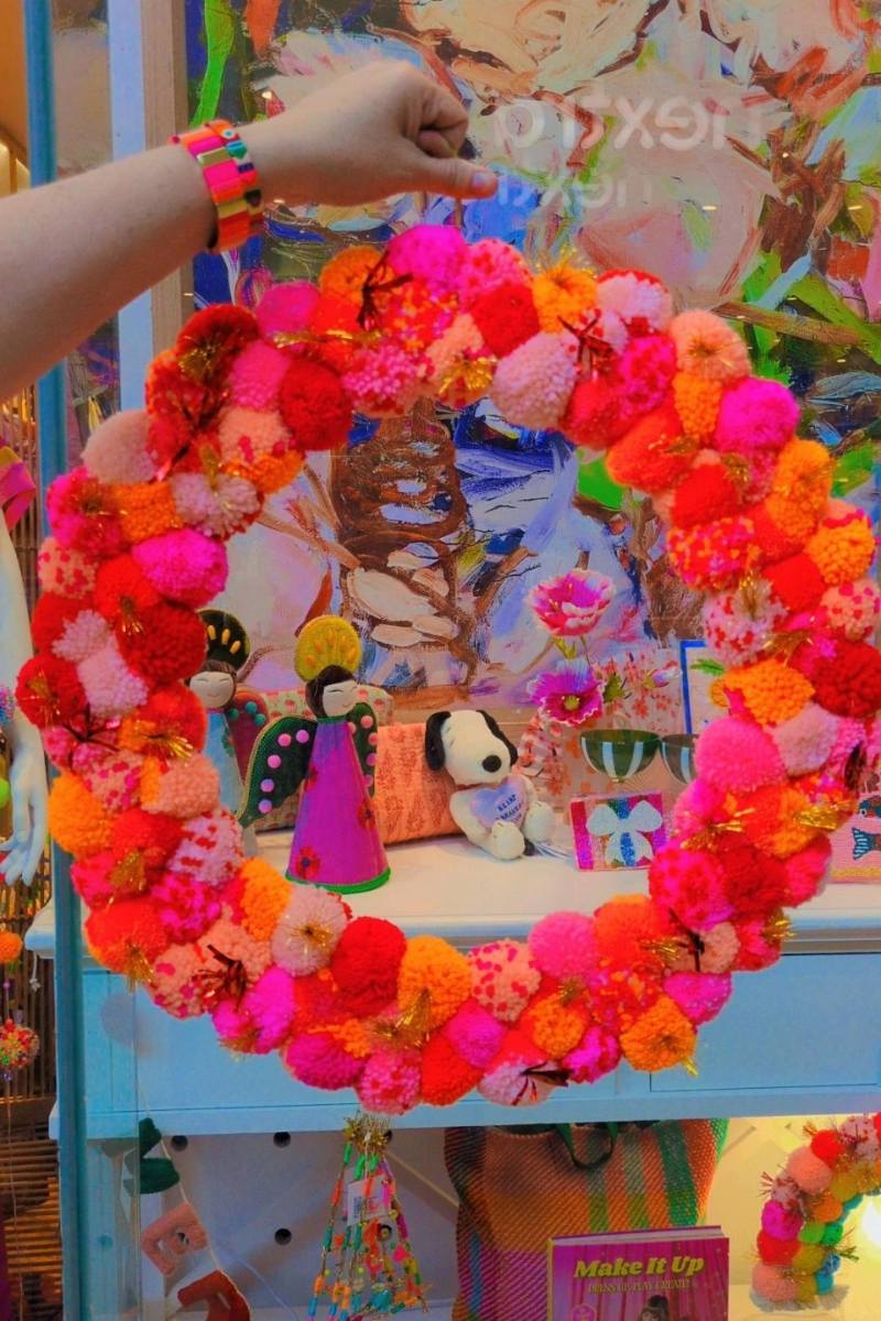Colourful pink and orange pom pom wreath by Arissa Lifestyle available at Zebra Finch Style in Newcastle, NSW