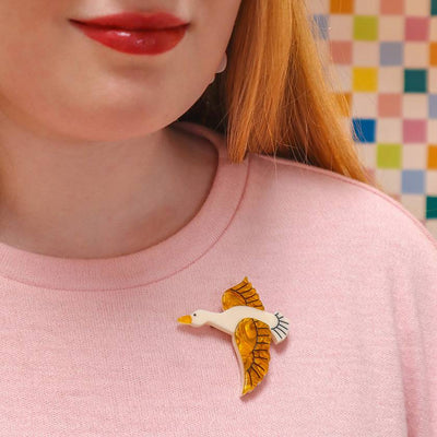 Beatrice Beswick resin brooch on model by Erstwilder from their 2024 Fan Favourite's collection