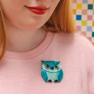 Beatrice the Barn Owl resin brooch on model by Erstwilder from their 2024 Fan Favourite's collection