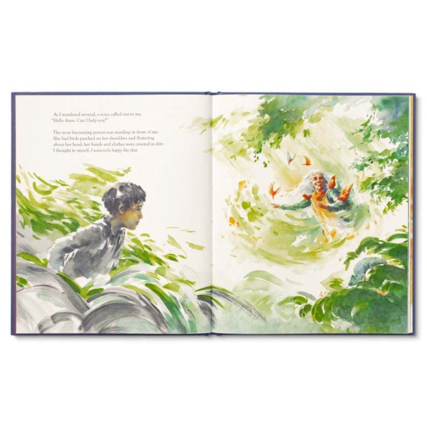 Open book with illustrations of a boy and a monkey in a jungle setting
