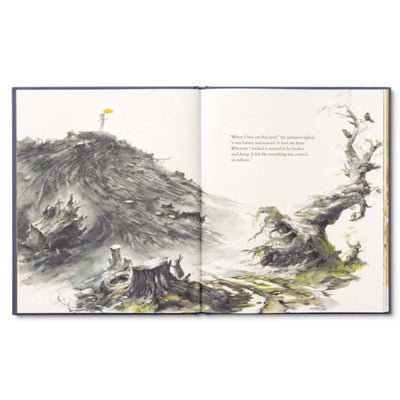 Open book with illustrations of a landscape and text on a white background
