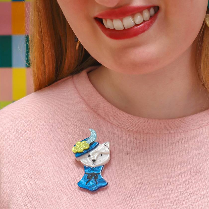 Cat in the hat resin brooch on model by Erstwilder from their 2024 Fan Favourite's Collection