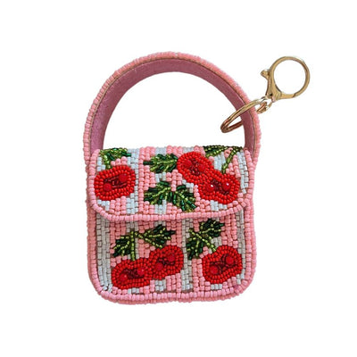 Pink beaded keychain with cherry design on a white background by Zoda | Stocked at Zebra Finch 