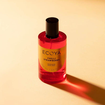 Ecoya Chilli Strawberry room spray bottle on a beige background