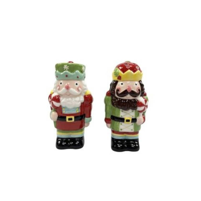 Two decorative figurines, one resembling a Santa Claus and the other a Nutcracker, on a white background.