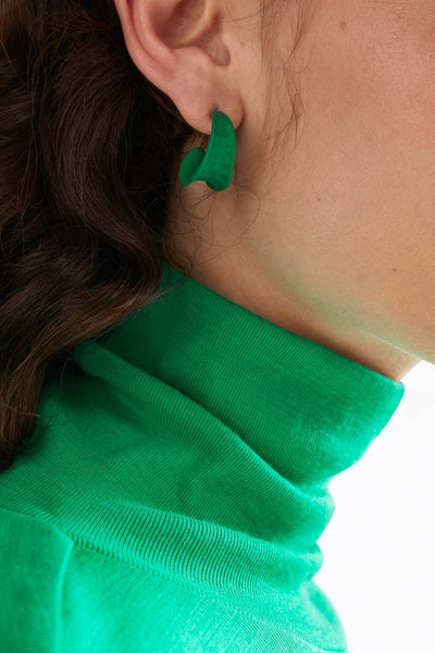 Dorn Hoop Earring in Aloe Green on model by Elk the Label