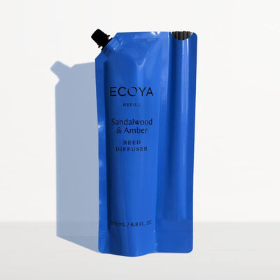 Blue ECOYA sandalwood & amber reed diffuser refill on a white background. Ecoya stockist at Zebra Finch in Newcastle, NSW