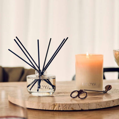 ECOYA diffuser with black reeds and a pink packaging box on a white background. Ecoya Stockist at Zebra Finch in Newcastle, NSW