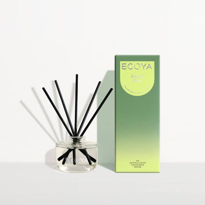 Ecoya diffuser with black reeds and a gradient packaging box on a white background. Eocya Stockist at Zebra Finch in Newcastle, NSW