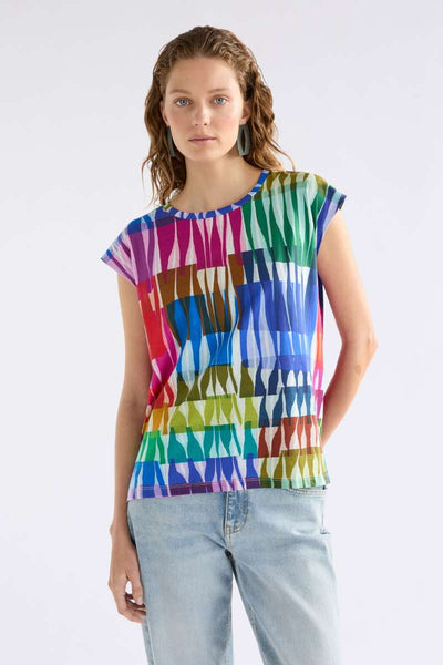 Colourful patterned top on a white background by Elk the Label - Anden Tee