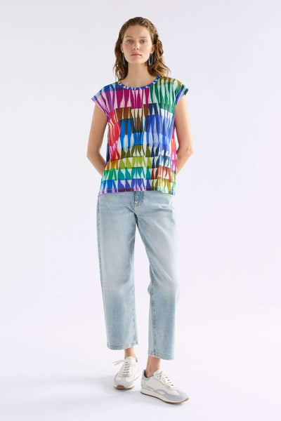 Colourful patterned top on a white background by Elk the Label - Anden Tee