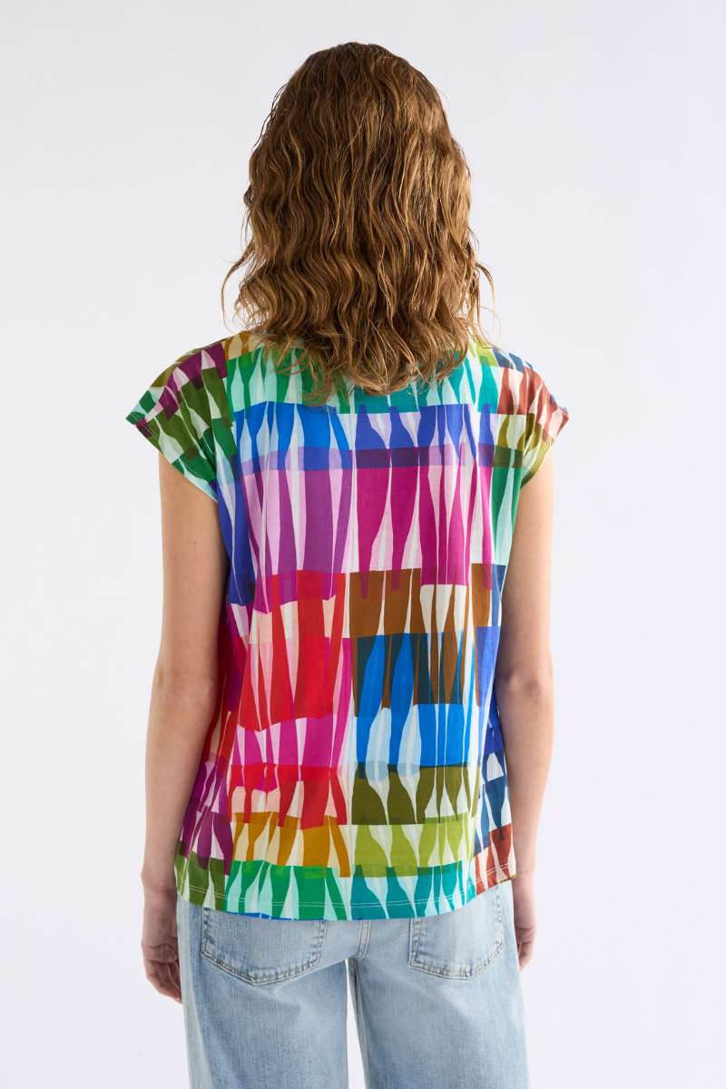 Colourful patterned top on a white background by Elk the Label - Anden Tee