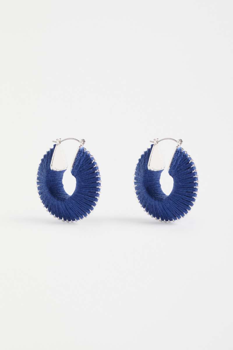 Pair of blue hoop earrings on a white background - Ledde Hoop Earrings by Elk the Label