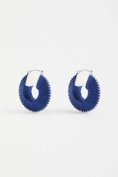 Pair of blue hoop earrings on a white background - Ledde Hoop Earrings by Elk the Label