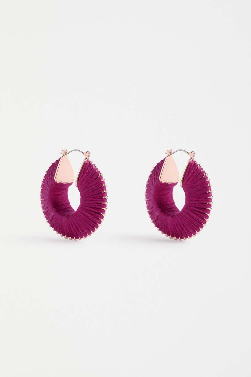 Pair of blue hoop earrings on a white background - Ledde Hoop Earrings by Elk the Label