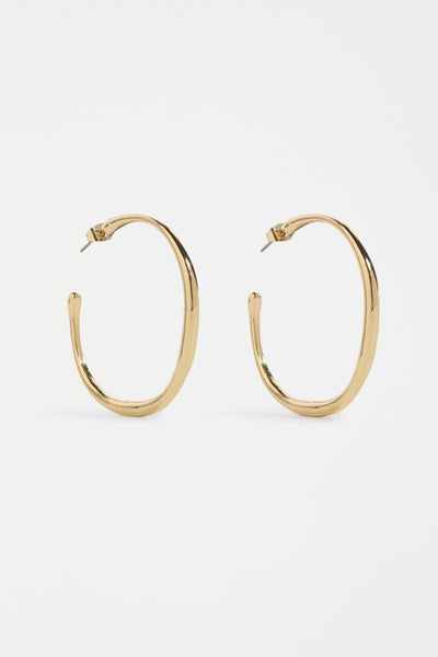 Gold hoop earrings on a white background