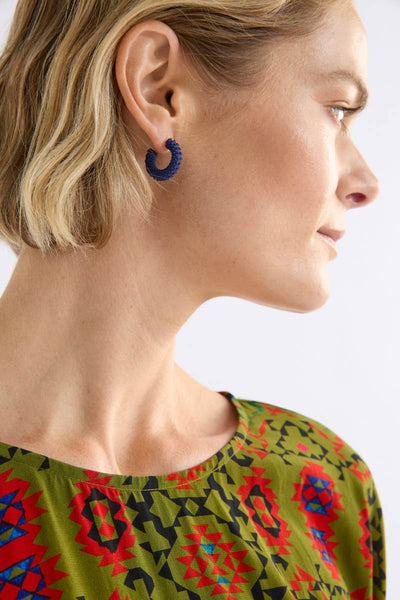 Green hoop earrings on a white background by Elk the Label | Elk Stockist in Newcastle, NSW at Zebra Finch Style