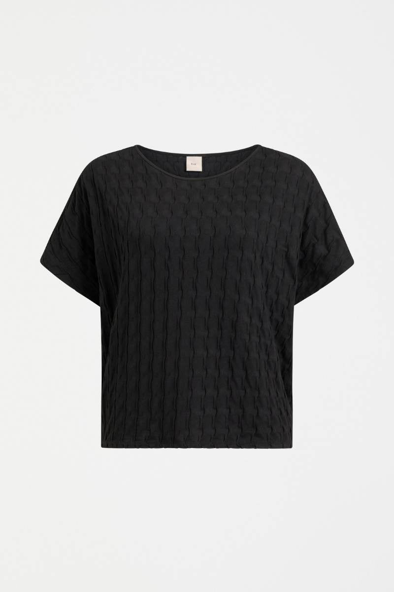 Black t-shirt on a white background Woman wearing a black textured top and orange pants on a white background by Elk the Label | Elk Stockist in Newcastle, NSW at Zebra Finch Style
