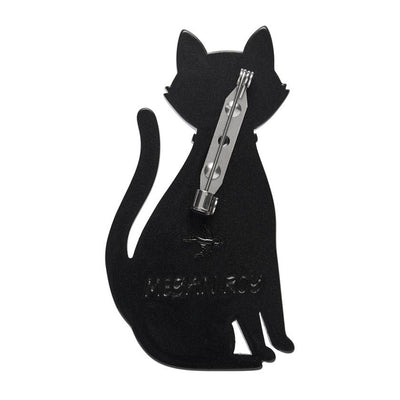 Black cat figurine with pink ears and a green collar on a white background, resin brooch by Erstwilder | Erstwilder Stockist in Newcastle, NSW at Zebra Finch Style