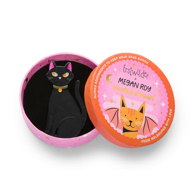 Black cat figurine with pink ears and a green collar on a white background, resin brooch by Erstwilder | Erstwilder Stockist in Newcastle, NSW at Zebra Finch Style