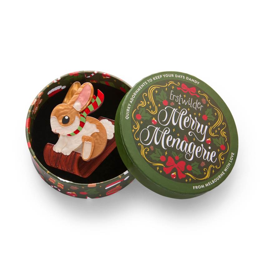 Decorative rabbit figurine with a scarf on a white background | Resin brooch by Erstwilder from their Merry Merangie Christmas collection