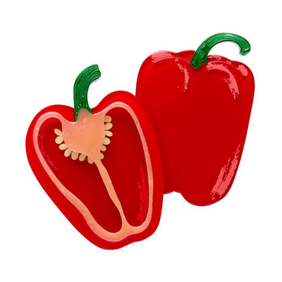 Red capsicum cut in half with a white background - Erstwilder resin brooch from their In Praise of Veg Collection
