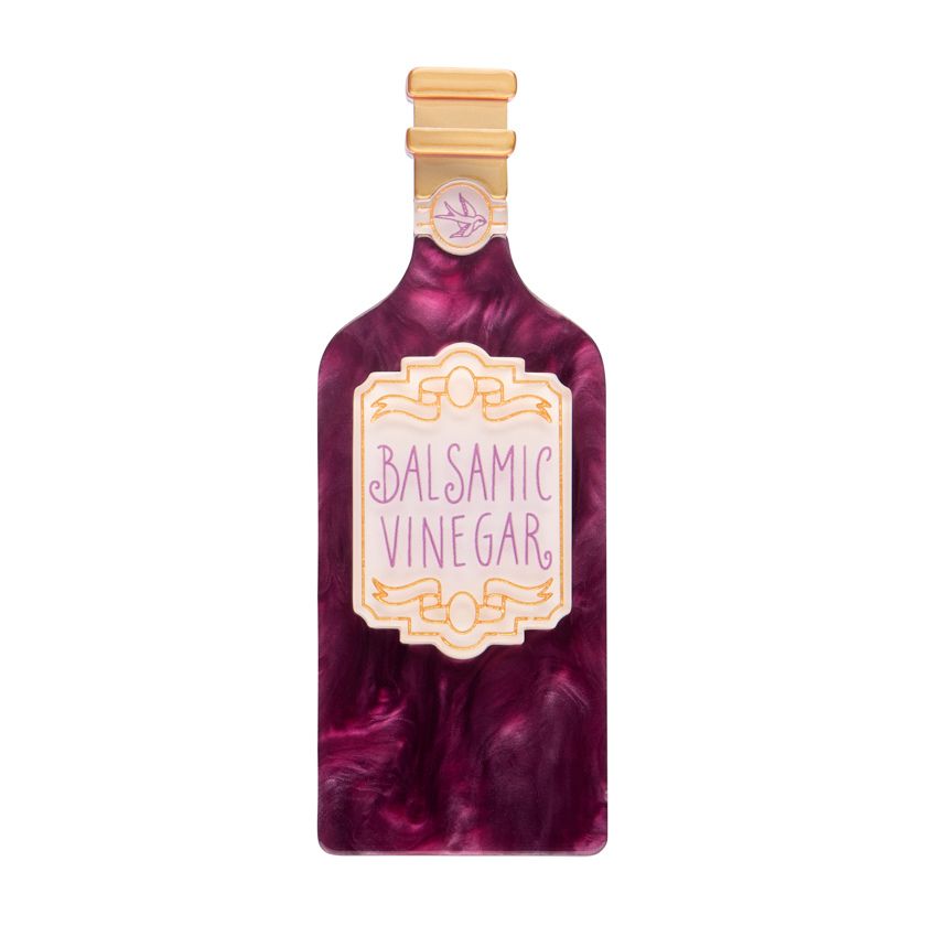 Bottle of balsamic vinegar with a marbled design on a white background - resin brooch by Erstwilder from their 2025 Condiments collection