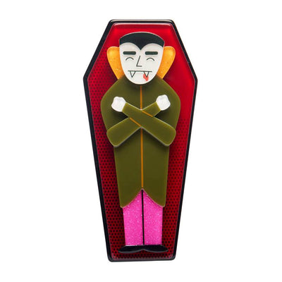 Character in a coffin with red interior on a white background - Cozy Coffin Brooch by Erstwilder from their 2025 Hauntd at Heart Collection. Erstwilder Stockist in Newcastle, NSW at Zebra Finch Style