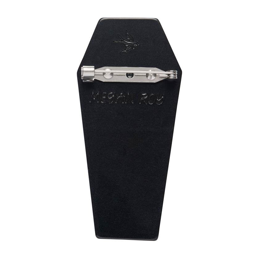 Character in a coffin with red interior on a white background - Cozy Coffin Brooch by Erstwilder from their 2025 Hauntd at Heart Collection. Erstwilder Stockist in Newcastle, NSW at Zebra Finch Style