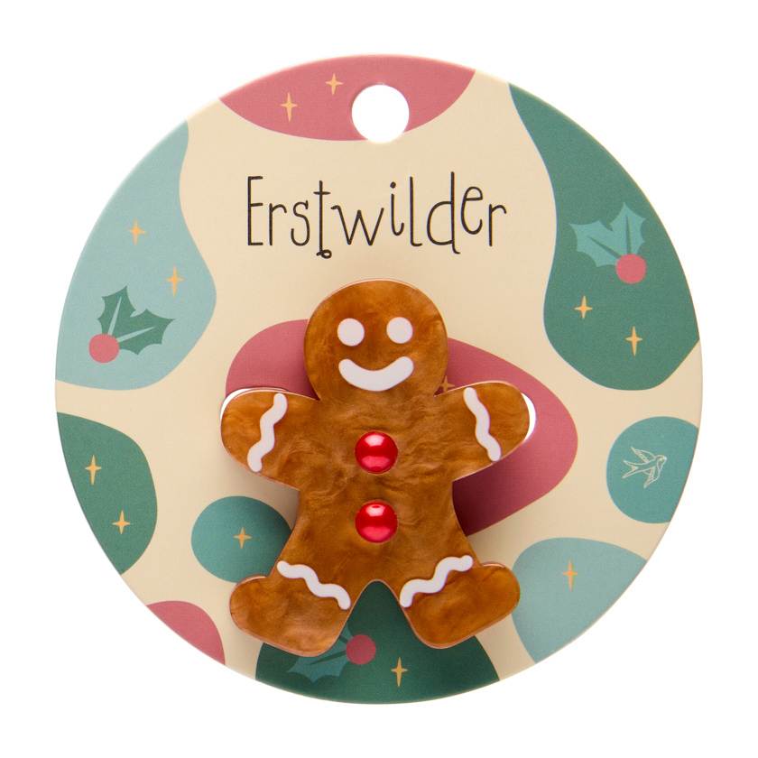 Gingerbread man brooch on a white background | By Erstwilder