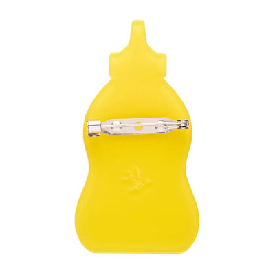 Yellow mustard bottle with a white label on a white background - Erstwilder's Mustard Moments brooch from their Condiments collection