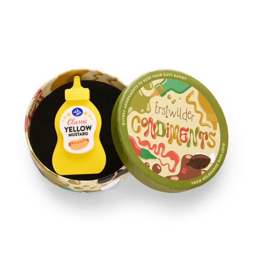 Yellow mustard bottle with a white label on a white background - Erstwilder's Mustard Moments brooch from their Condiments collection