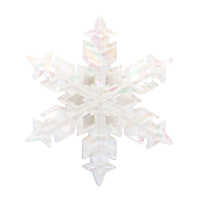 Iridescent snowflake-shaped brooch on a white background by Erstwildee