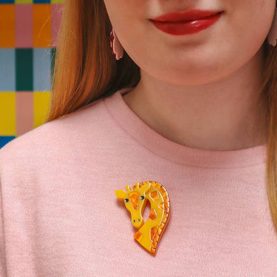Gingerly Awaiting Gina resin brooch on model by Erstwilder from their 2024 Fan Favourites collection