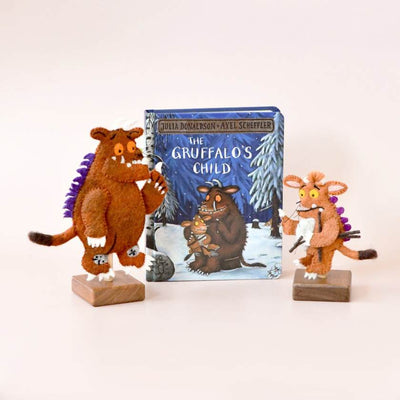 Felt figures of characters from 'The Gruffalo's Child' book on a white background