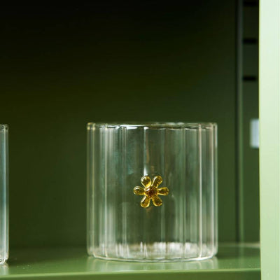 Clear glass tumbler with a yellow flower by Robert Gordon | Robert Gordon Stockist in Newcastle, NSW