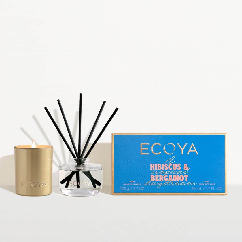 Ecoya candle, diffuser, and packaging on a white background