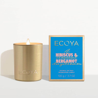 ECOYA candle with a blue label on a white background